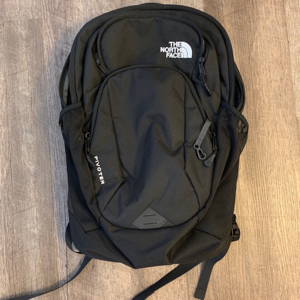 North face Pivator black backpack many pockets